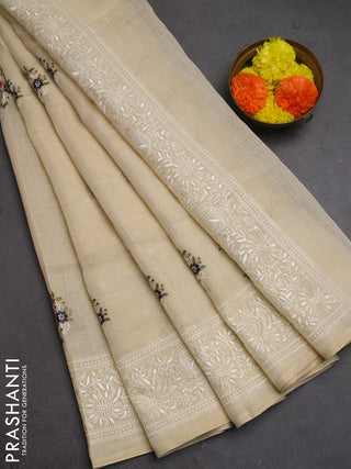 Linen cotton saree dark grey with allover embroidery buttas and embroidery pallu