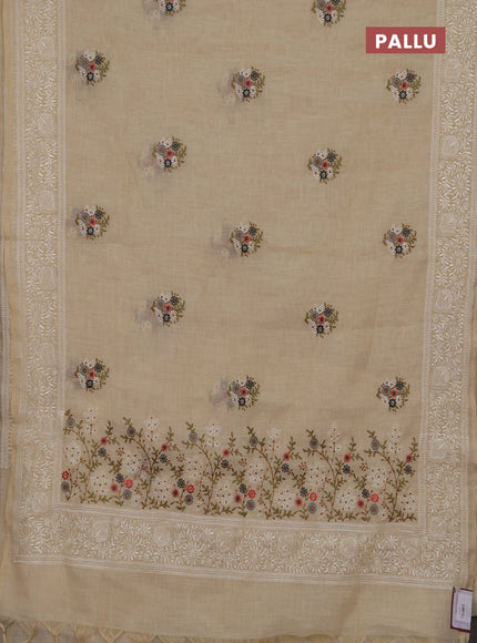 Linen cotton saree dark grey with allover embroidery buttas and embroidery pallu