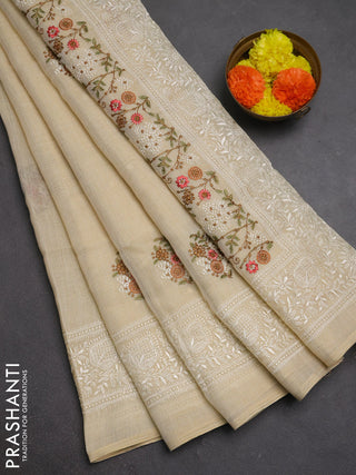 Linen cotton saree cream and pink with allover embroidery buttas and embroidery pallu