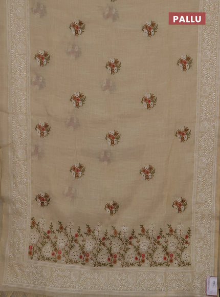 Linen cotton saree cream and pink with allover embroidery buttas and embroidery pallu