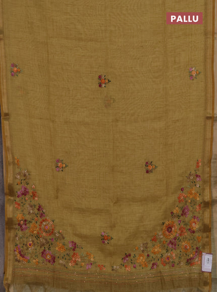 Tissue linen saree mustard yellow with allover embroidery buttas and embroidery kantha stitch work pallu