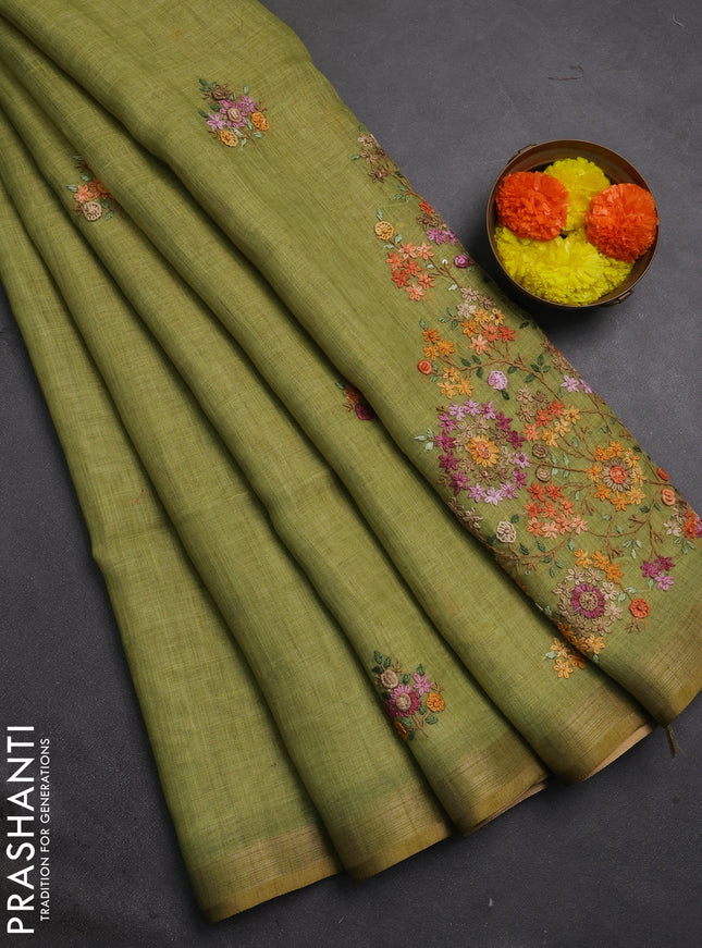 Tissue linen saree green with allover embroidery buttas and embroidery kantha stitch work pallu