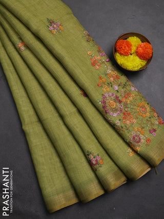 Tissue linen saree green with allover embroidery buttas and embroidery kantha stitch work pallu