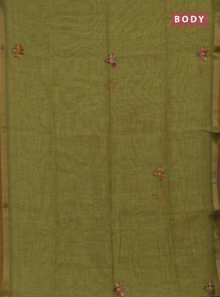 Tissue linen saree green with allover embroidery buttas and embroidery kantha stitch work pallu