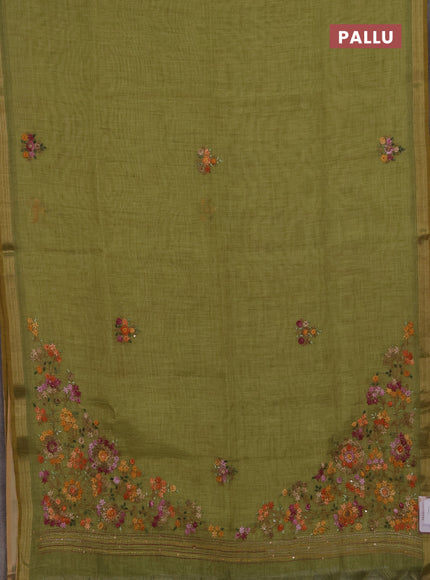 Tissue linen saree green with allover embroidery buttas and embroidery kantha stitch work pallu