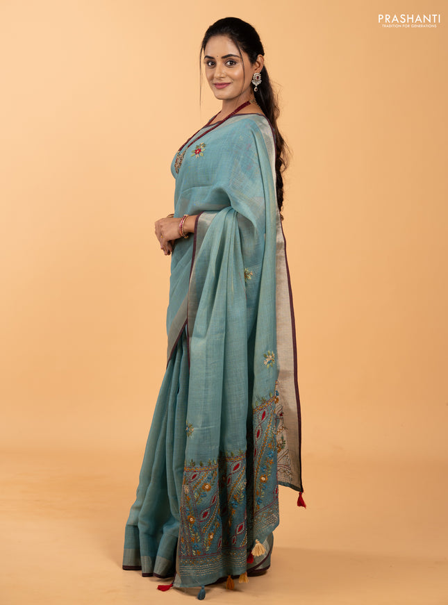 Tissue linen saree teal blue and maroon with allover embroidery buttas and embroidery kantha stitch work pallu