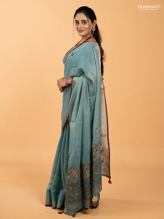 Tissue linen saree teal blue and maroon with allover embroidery buttas and embroidery kantha stitch work pallu