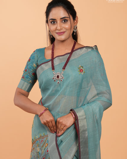 Tissue linen saree teal blue and maroon with allover embroidery buttas and embroidery kantha stitch work pallu