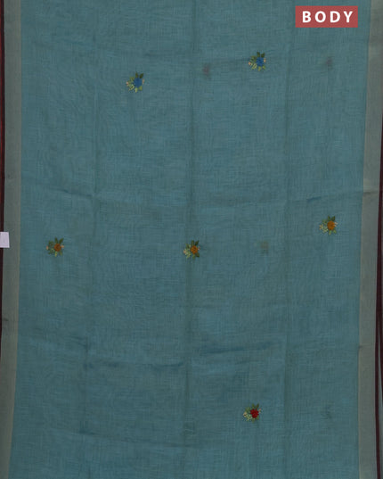 Tissue linen saree teal blue and maroon with allover embroidery buttas and embroidery kantha stitch work pallu