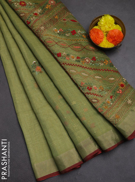 Tissue linen saree light green and maroon with allover embroidery buttas and embroidery kantha stitch work pallu