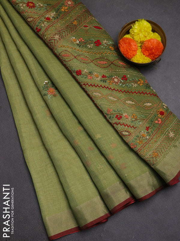 Tissue linen saree light green and maroon with allover embroidery buttas and embroidery kantha stitch work pallu