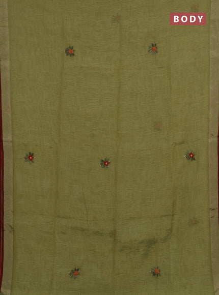 Tissue linen saree light green and maroon with allover embroidery buttas and embroidery kantha stitch work pallu