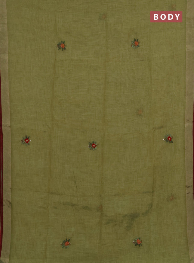 Tissue linen saree light green and maroon with allover embroidery buttas and embroidery kantha stitch work pallu