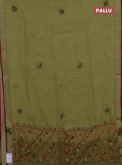 Tissue linen saree light green and maroon with allover embroidery buttas and embroidery kantha stitch work pallu
