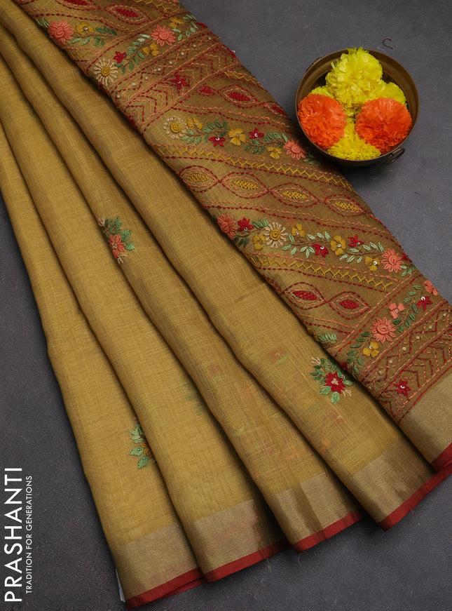 Tissue linen saree mustard green and red with allover embroidery buttas and embroidery kantha stitch work pallu
