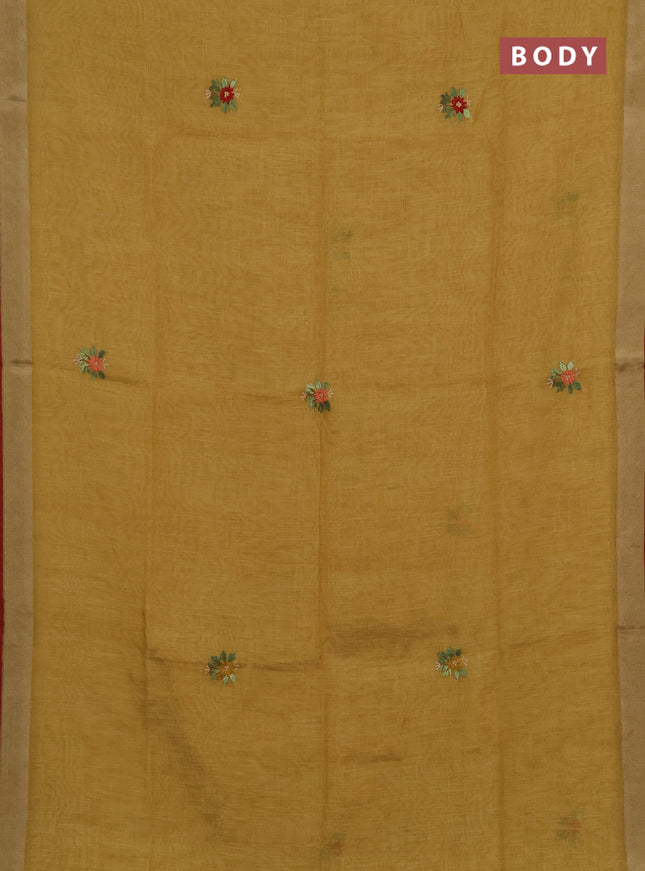Tissue linen saree mustard green and red with allover embroidery buttas and embroidery kantha stitch work pallu