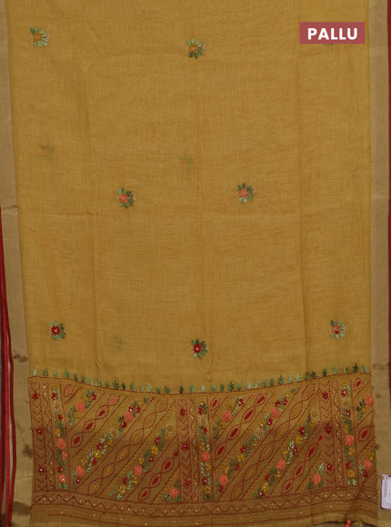 Tissue linen saree mustard green and red with allover embroidery buttas and embroidery kantha stitch work pallu