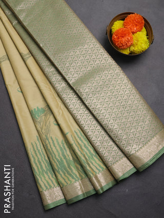 Bangalori silk saree pale yellow and green shade with allover ikat weaves and zari woven border