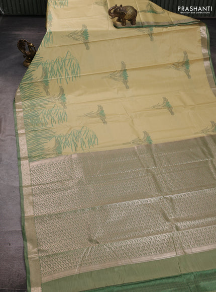 Bangalori silk saree pale yellow and green shade with allover ikat weaves and zari woven border