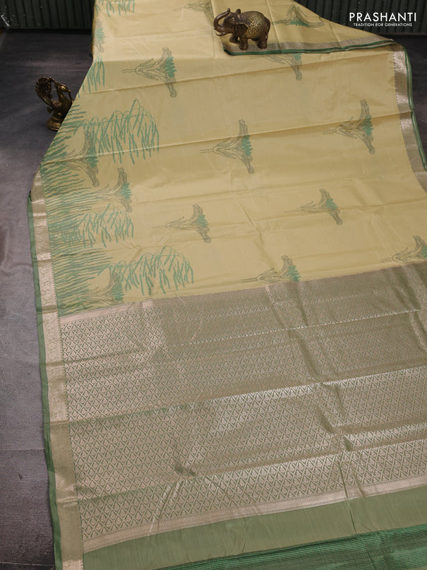 Bangalori silk saree pale yellow and green shade with allover ikat weaves and zari woven border