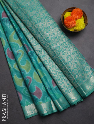 Bangalori silk saree teal green with allover ikat weaves and zari woven border