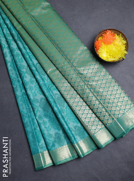Bangalori silk saree teal green with allover ikat weaves and zari woven border