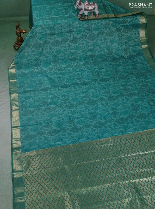 Bangalori silk saree teal green with allover ikat weaves and zari woven border