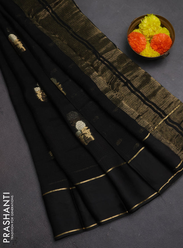 Art kota silk saree black with silver & zari woven floral buttas and rettapet zari woven border