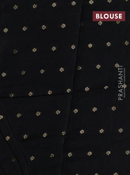 Art kota silk saree black with silver & zari woven floral buttas and rettapet zari woven border