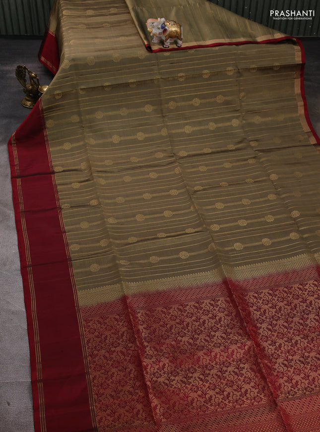 Pure soft silk saree olive green and red with allover zari stripes & buttas and rettapet zari woven border