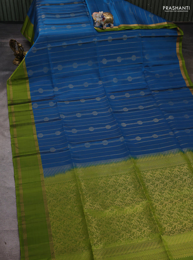 Pure soft silk saree peacock blue and light green with allover zari stripes & buttas and rettapet zari woven border