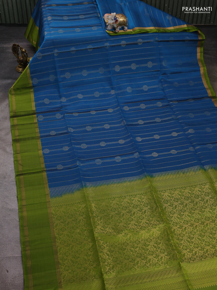 Pure soft silk saree peacock blue and light green with allover zari stripes & buttas and rettapet zari woven border