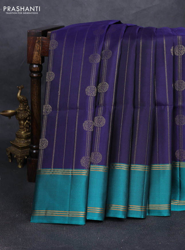 Pure soft silk saree navy blue and teal green with allover zari stripes & buttas and rettapet zari woven border