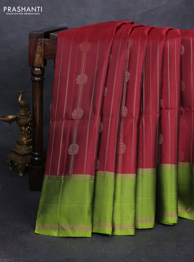 Pure soft silk saree deep maroon and light green with allover zari stripes & buttas and rettapet zari woven border