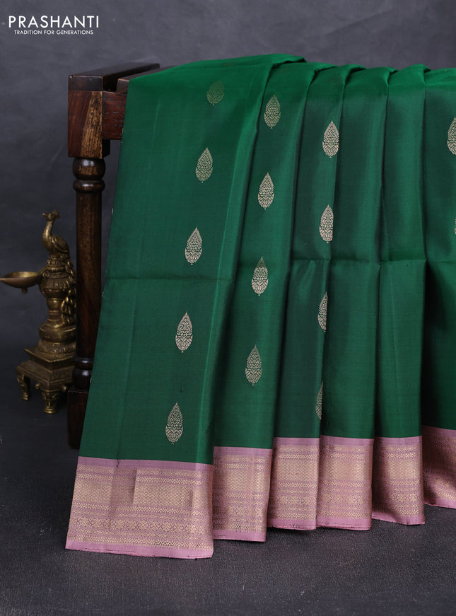 Pure soft silk saree dark green and peach pink with allover zari woven buttas and zari woven border