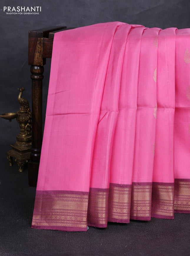Pure soft silk saree pink and deep wine with allover zari woven buttas and zari woven border