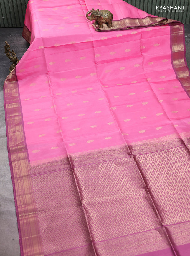 Pure soft silk saree pink and deep wine with allover zari woven buttas and zari woven border