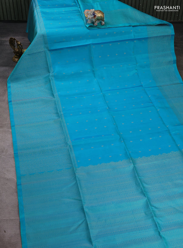 Pure soft silk saree cs blue with allover zari woven buttas and long zari woven border