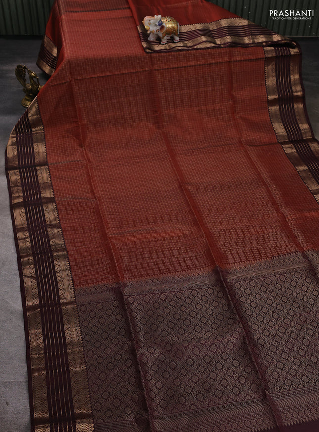 Pure soft silk saree rust shade and deep wine shade with allover small checked pattern and zari woven border