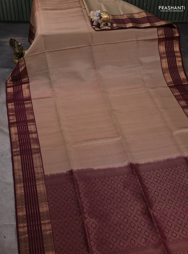 Pure soft silk saree beige and deep wine shade with allover small checked pattern and zari woven border