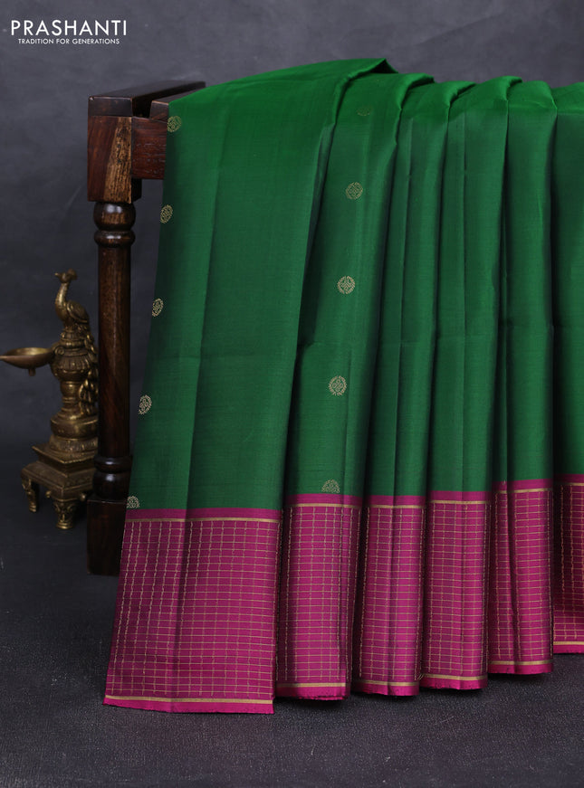 Pure soft silk saree bottle green and magenta pink with zari woven buttas and zari woven border