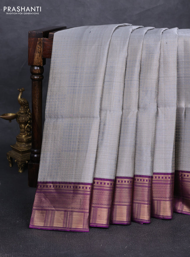 Pure soft silk saree grey and purple with allover checked pattern and zari woven border