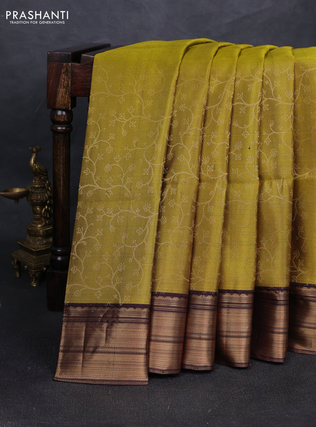Pure soft silk saree mehendi green and coffee brown with allover zari weaves and zari woven border