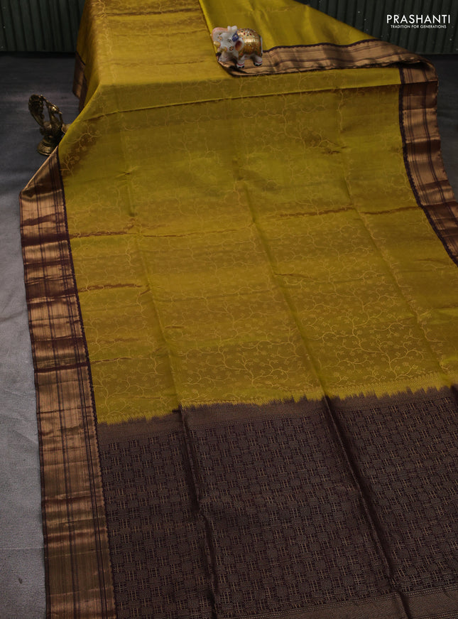 Pure soft silk saree mehendi green and coffee brown with allover zari weaves and zari woven border