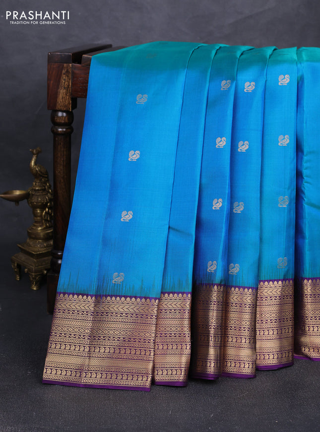 Pure soft silk saree dual shade of bluish green and purple with zari woven annam buttas and zari woven border