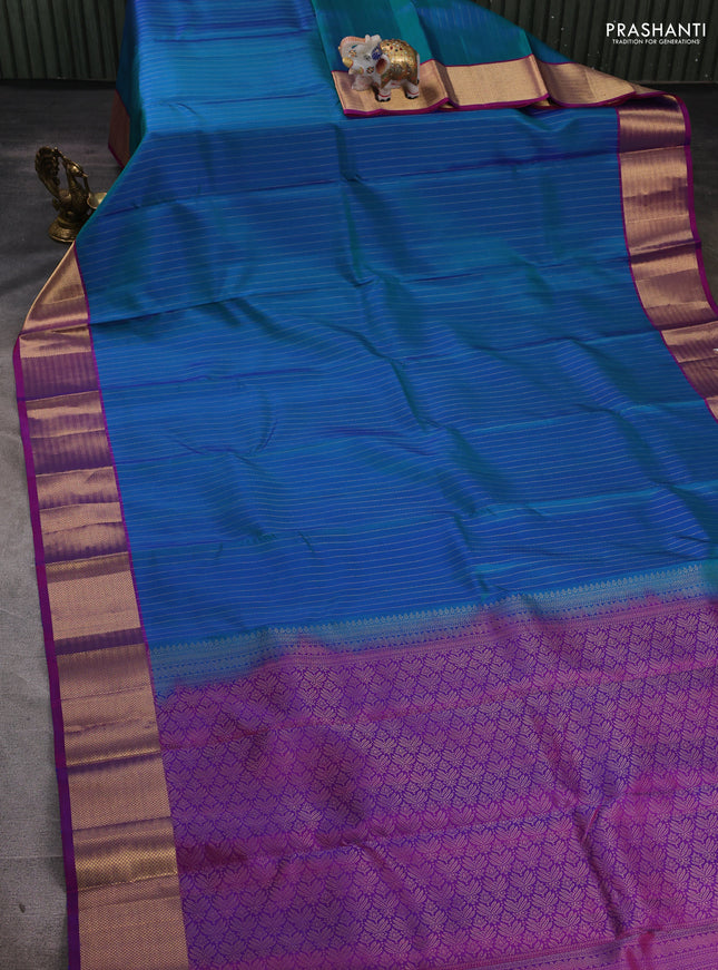 Pure soft silk saree dual shade of bluish green and purple with allover zari stripe pattern and zari woven border