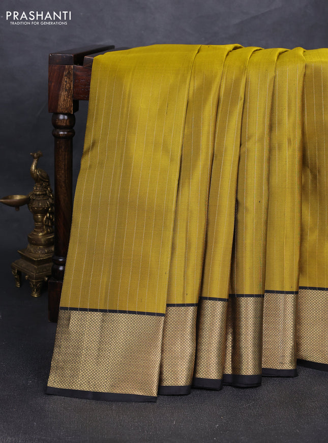 Pure soft silk saree mehendi green and black with allover zari stripe pattern and zari woven border