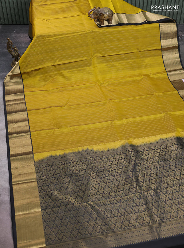 Pure soft silk saree mehendi green and black with allover zari stripe pattern and zari woven border