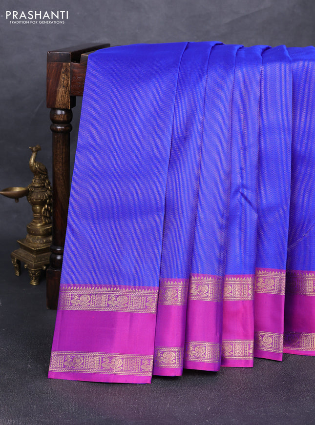 Pure soft silk saree royal blue and purple with allover zari woven brocade weaves and rettapet zari woven border