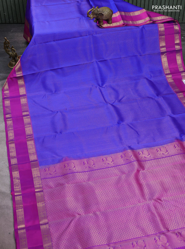 Pure soft silk saree royal blue and purple with allover zari woven brocade weaves and rettapet zari woven border